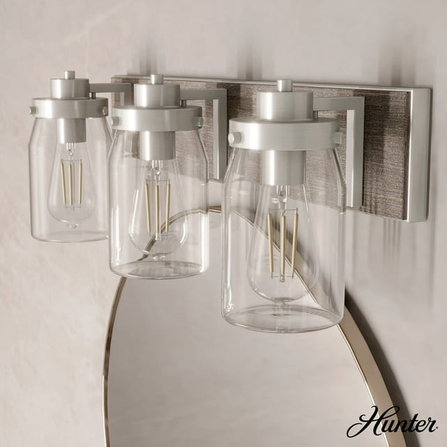 Hunter Devon Park with Clear Glass Bathroom Vanity Wall Light Fixture
