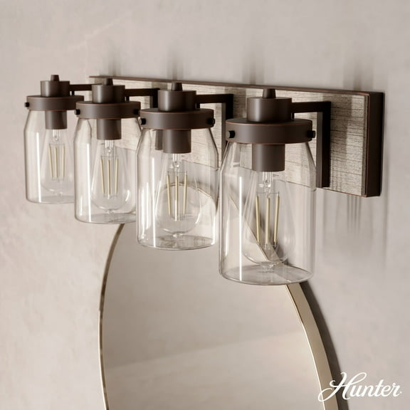 Hunter Devon Park with Clear Glass Bathroom Vanity Wall Light Fixture