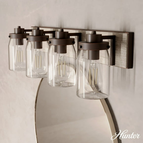 Hunter Devon Park with Clear Glass Bathroom Vanity Wall Light Fixture