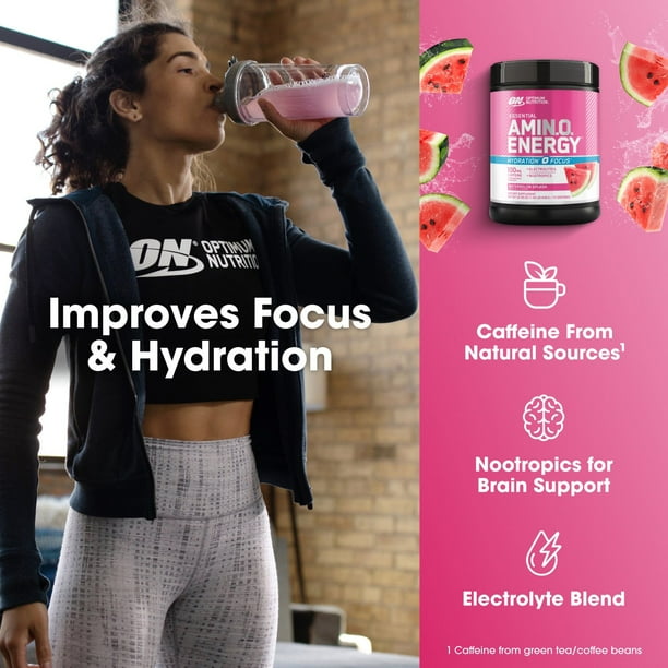 Focused woman reading in cozy chair with tea - Optimum Nutrition, Amino Energy + Focus, Pre-Workout, Watermelon ...