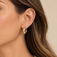 thumbnail image 4 of Graduated Open Hoop Earrings in 14K Gold, 4 of 6
