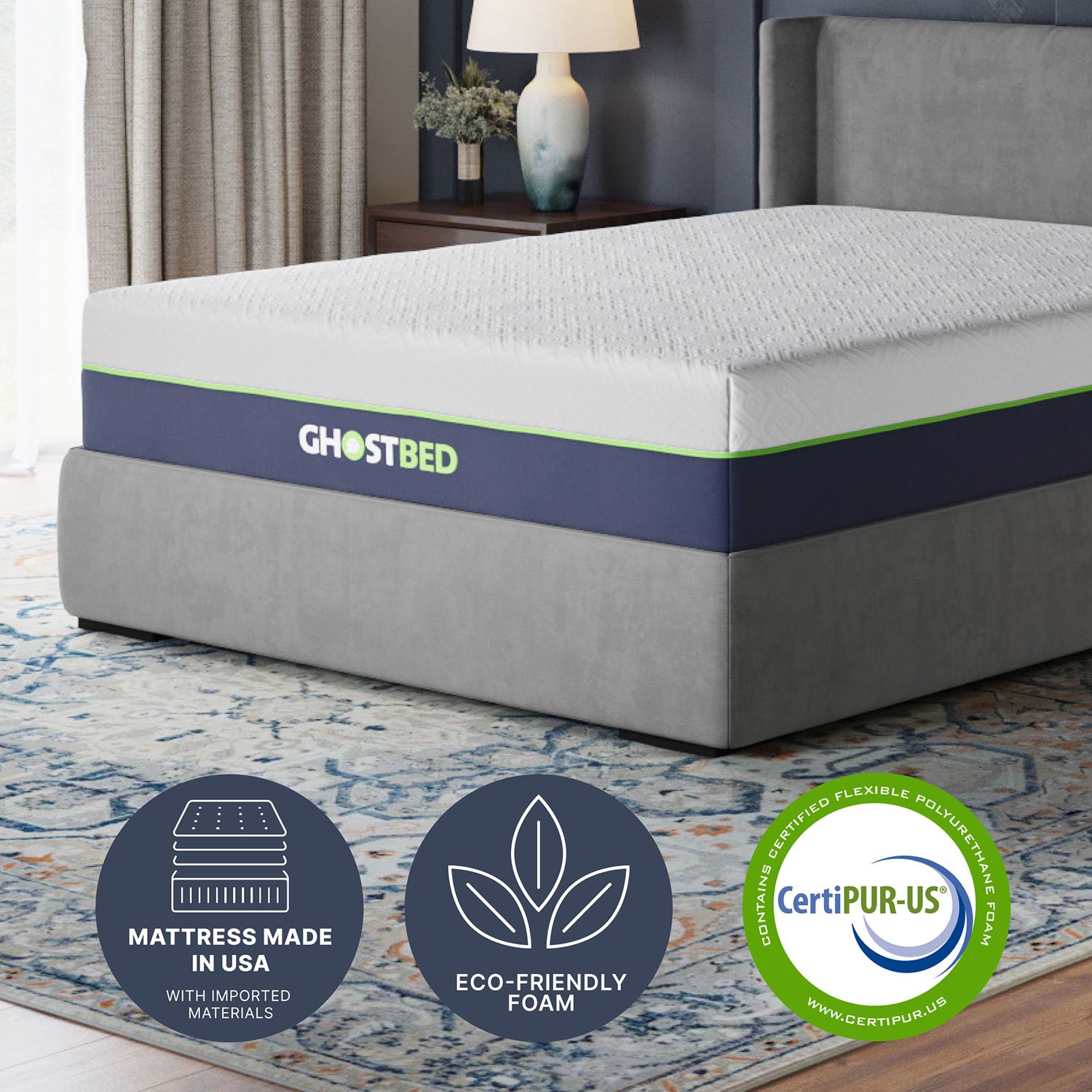 Side view of GhostBed mattress on base with branding