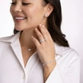 thumbnail image 5 of Emerald Cut Lab Created Gemstone & 0.11 CT. T.W. Diamond Stud Earrings in Sterling Silver, 5 of 6