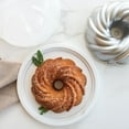 thumbnail image 3 of Nordic Ware 2-Piece Formed  Bundt Pan And Bundt Keeper, Assorted Shapes And Colors, 3 of 8