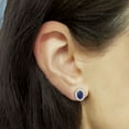 thumbnail image 2 of Oval Cut Genuine Gemstone & 0.16 CT.T.W. Diamond Halo Stud Earrings in 14K Gold, 2 of 3
