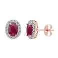 thumbnail image 1 of Oval Cut Genuine Gemstone & 0.16 CT.T.W. Diamond Halo Stud Earrings in 14K Gold, 1 of 3