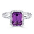 thumbnail image 1 of Emerald Cut Gemstone & 0.14 CT. T.W. Halo Diamond Ring in Sterling Silver, 1 of 5