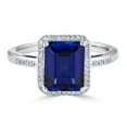 thumbnail image 1 of Emerald Cut Gemstone & 0.14 CT. T.W. Halo Diamond Ring in Sterling Silver, 1 of 5