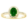 thumbnail image 1 of Oval Cut Gemstone and 0.15 CT. T.W. Halo Diamond Ring in 14K Gold, 1 of 5