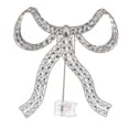 thumbnail image 2 of Member's Mark Pre-Lit Jeweled Bow Tree Topper, 2 of 3