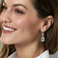 thumbnail image 5 of 1.60 C.T. TW Baguette and Round Cut Diamond Dangle Earrings in 14K Gold, 5 of 6