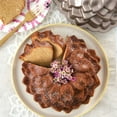 thumbnail image 4 of Nordic Ware Toffee Blossom Bundt Pan with Bundt Keeper, 4 of 8