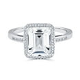thumbnail image 1 of Emerald Cut Gemstone & 0.14 CT. T.W. Halo Diamond Ring in Sterling Silver, 1 of 4