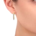 thumbnail image 4 of Diamond Cut Oval Bypass Hoop Earrings in 14K Yellow Gold, 4 of 5