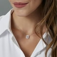 thumbnail image 5 of 0.70 C.T. TW Baguette and Round Cut Halo Diamond Pendant in 14K Gold, 5 of 6