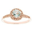 thumbnail image 1 of Round Cut Gemstone & 0.13 CT. T.W. Halo Diamond Ring in 14K Gold, 1 of 6