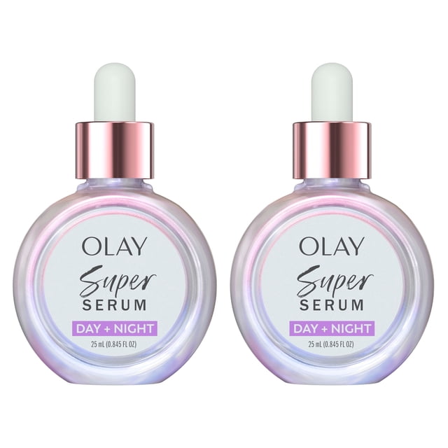 olay super serum day + night, 1.69 oz., 2 pk. Front-facing pair of 0.845 fl oz round glass dropper bottles labeled OLAY Super Serum with a purple 'DAY + NIGHT' band; rose-gold metal caps and white rubber droppers, iridescent pearl finish, white studio background; travel-friendly AM/PM anti-aging serum set.