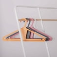 thumbnail image 8 of The Original Kangaroo™ Hanger 40-Pack - Made in Wisconsin, USA with 100% recycled material - The patented design clips in pants, shirts, straps, tanks, jackets and even entire outfits on a single hanger, 8 of 9